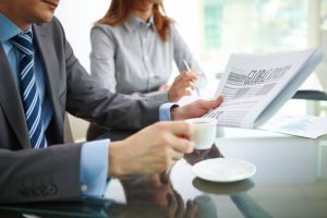 businessman-drinking-coffee-reading-newspaper_1098-2761 businessman-drinking-coffee-reading-newspaper_1098-2761